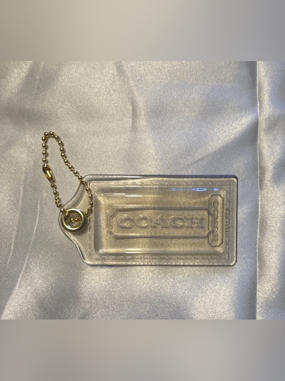 Coach Clear Hangtag (Poppy).  3.5 in